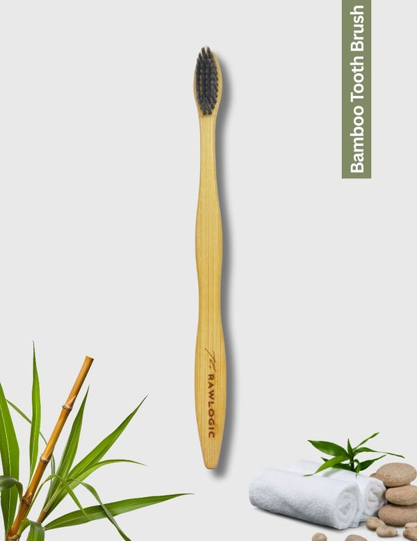 Front view of Rawlogic Bamboo Toothbrush featuring activated charcoal bristles for natural teeth whitening and oral care