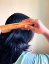 Neem handle comb used for daily grooming and precise styling