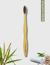 Front view of Rawlogic Bamboo Toothbrush featuring activated charcoal bristles for natural teeth whitening and oral care